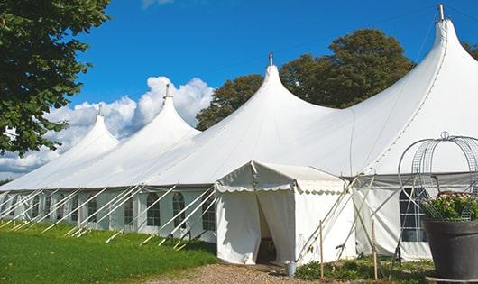 portable restrooms equipped for hygiene and comfort at an outdoor festival in Oldfield